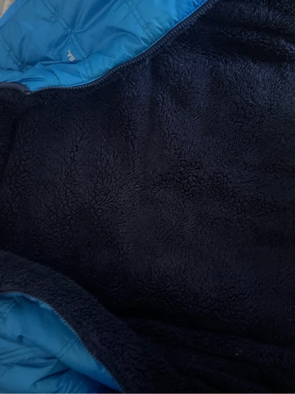 Children's jacket for cold waterproof and plush inside